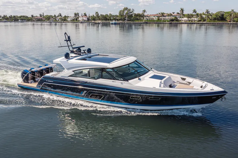 Slide: The Image of 2022 Formula 500 Super Sport Crossover yacht cruising on a serene waterway. - 9