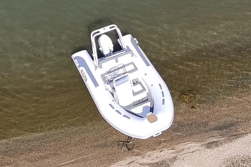 Slide: The Image of Manufacturer Provided Image: Aerial view of 2025 Tide Craft Beaver 10 boat on sandy shoreline. - 3