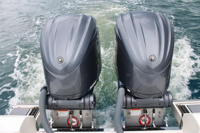 Slide: The Image of Twin Yamaha outboard engines on 2024 ShearWater 270 SS Open Carolina boat. - 13