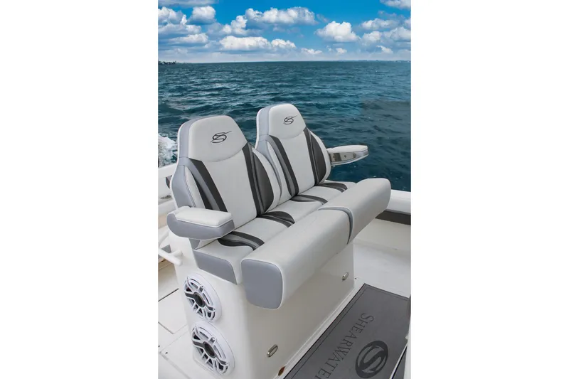 Slide: The Image of 2024 ShearWater 270 SS Open Carolina boat seats with ocean view. - 17