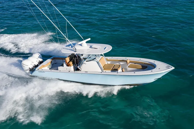 The Image of 2022 Valhalla Boatworks V-37 cruising on clear blue ocean waters. - 0