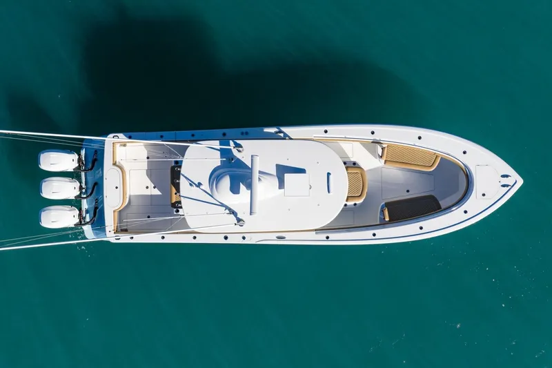 Slide: The Image of Overhead view of 2022 Valhalla Boatworks V-37 on clear blue water. - 12