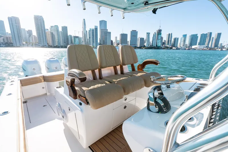 Slide: The Image of 2022 Valhalla Boatworks V-37 on water with city skyline in background. - 22