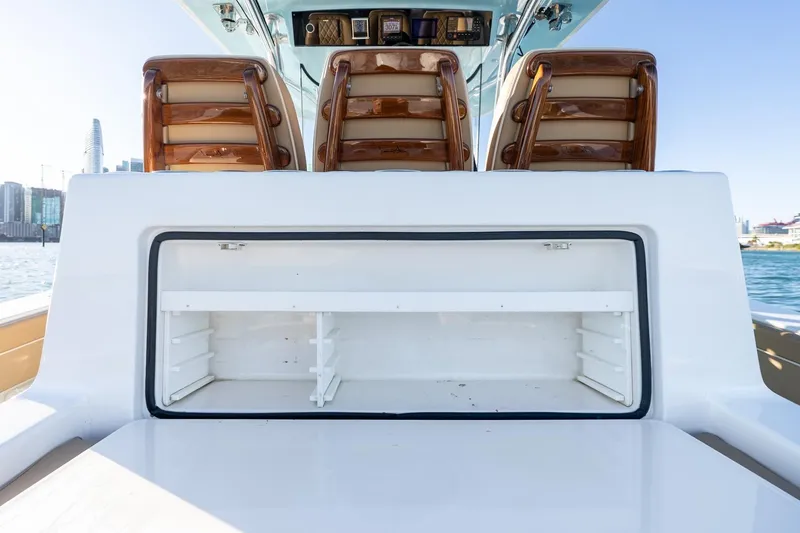 Slide: The Image of 2022 Valhalla Boatworks V-37 interior with storage compartment and wooden seating. - 28