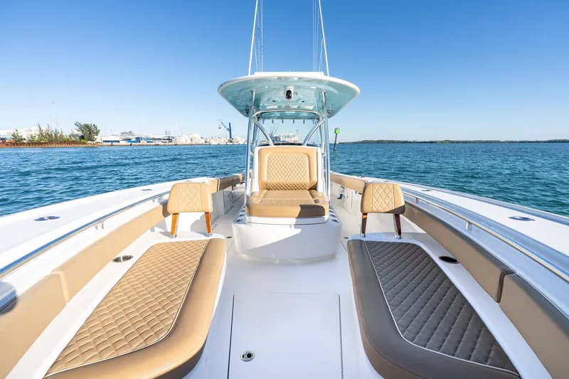 Slide: The Image of 2022 Valhalla Boatworks V-37, luxurious seating, open water, clear sky, modern design. - 36