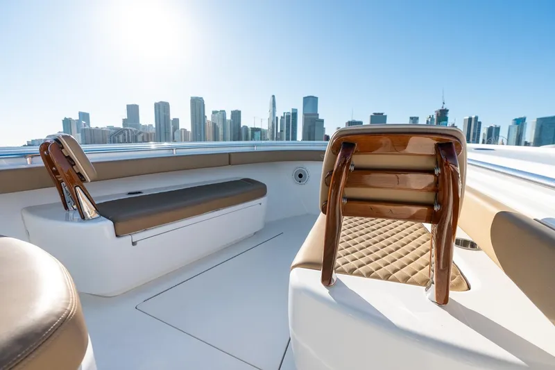 Slide: The Image of 2022 Valhalla Boatworks V-37 interior with city skyline in background. - 39