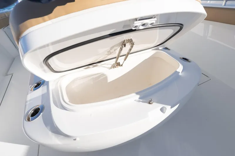 Slide: The Image of Open storage compartment on 2022 Valhalla Boatworks V-37, showcasing interior space. - 42