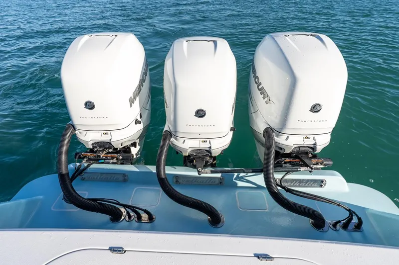 Slide: The Image of Triple Mercury outboard engines on 2022 Valhalla Boatworks V-37 in blue ocean. - 46