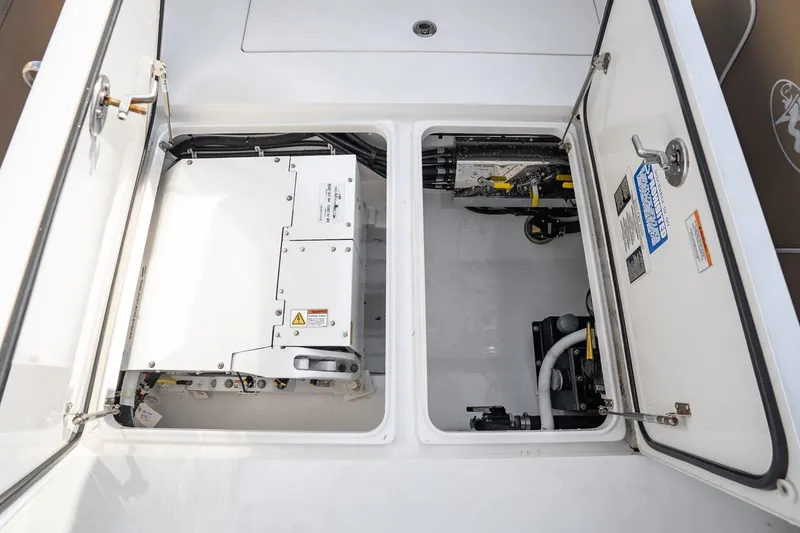 Slide: The Image of 2022 Valhalla Boatworks V-37 engine compartment with mechanical components and wiring. - 52