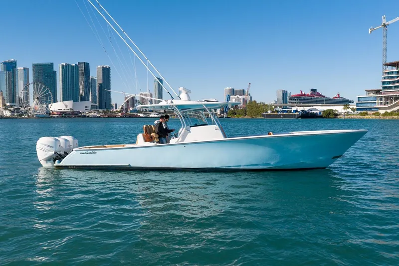 Slide: The Image of 2022 Valhalla Boatworks V-37 cruising in urban waterfront setting. - 9