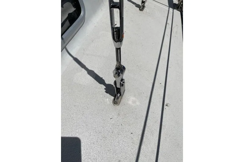 Slide: The Image of Close-up of a 1988 Caliber 38 sailboat deck with rigging hardware. - 10