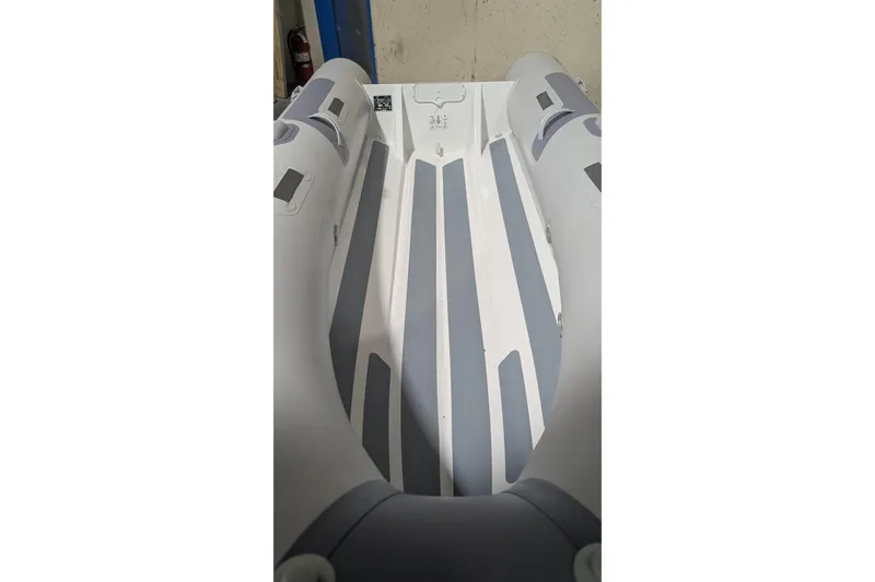 Slide: The Image of 2025 Zodiac Cadet RIB Alu 330 inflatable boat interior, featuring durable design and sleek lines. - 6