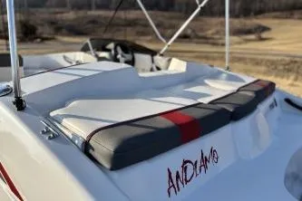 Slide: The Image of 2023 Tahoe T16 boat with cushioned seating and "Andiamo" text on the side. - 7