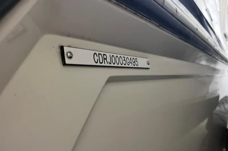Slide: The Image of 1995 Carver 325 Aft Cabin Motor Yacht hull identification number plate. - 24