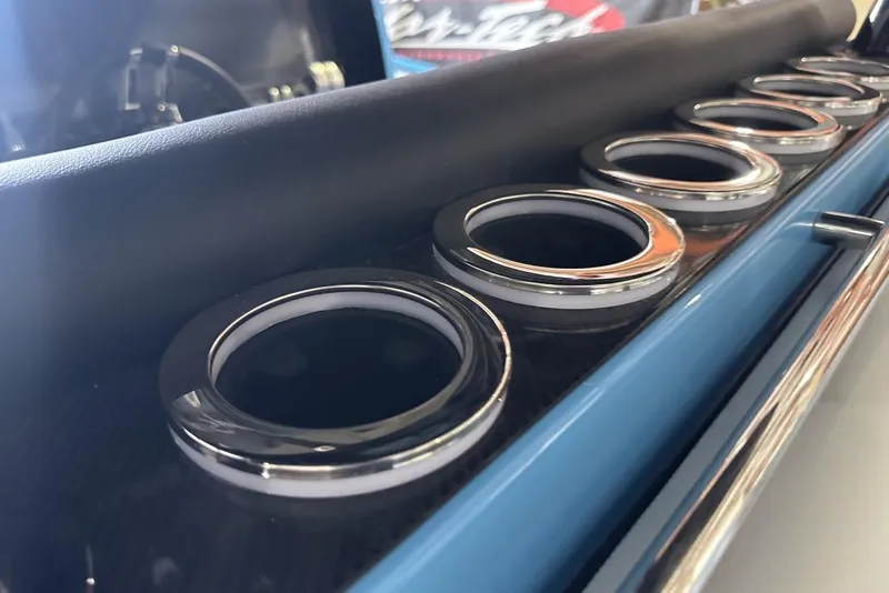 Slide: The Image of 2025 Nor-Tech 340 Sport Center Console cup holders in sleek, modern design. - 10