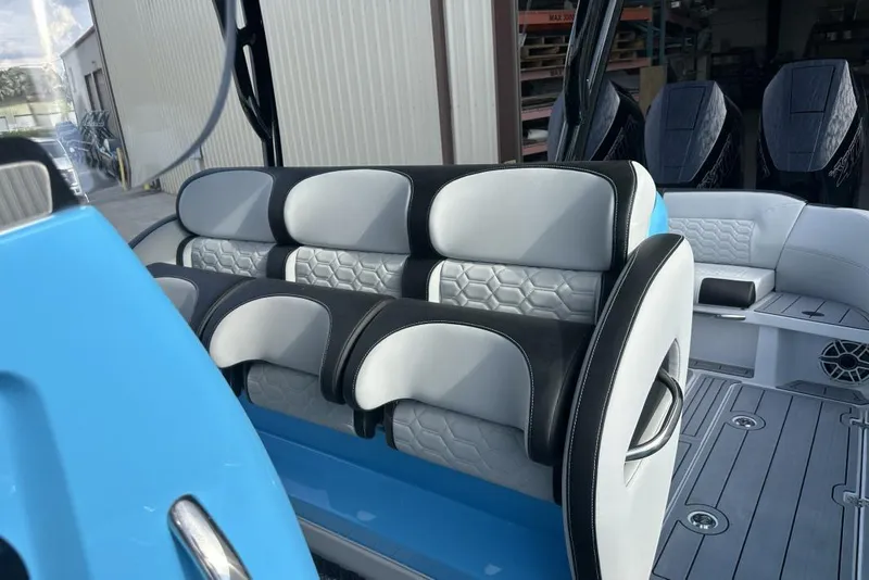 Slide: The Image of 2025 Nor-Tech 340 Sport Center Console interior with modern seating design. - 18