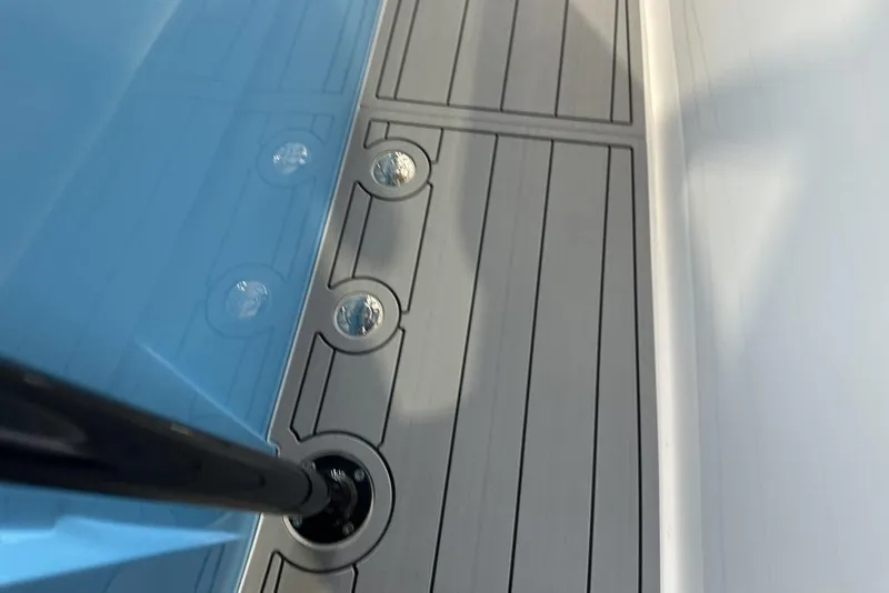 Slide: The Image of 2025 Nor-Tech 340 Sport Center Console deck with sleek design and modern fixtures. - 20