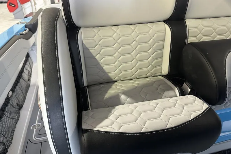 Slide: The Image of 2025 Nor-Tech 340 Sport Center Console seat with hexagonal pattern upholstery. - 3