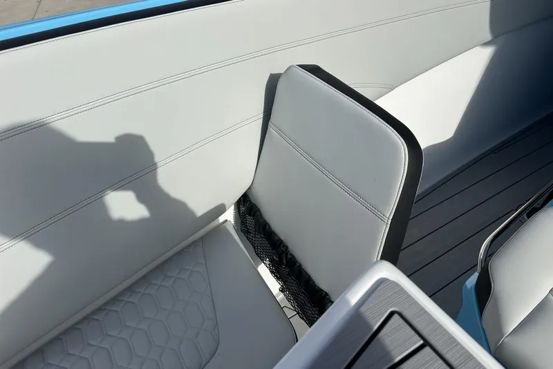 Slide: The Image of 2025 Nor-Tech 340 Sport Center Console interior with sleek seating and modern design. - 8