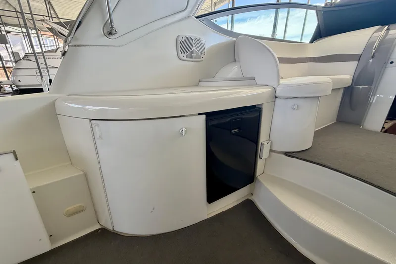 Slide: The Image of 2002 Formula 37 Performance Cruiser interior with seating and storage. - 12