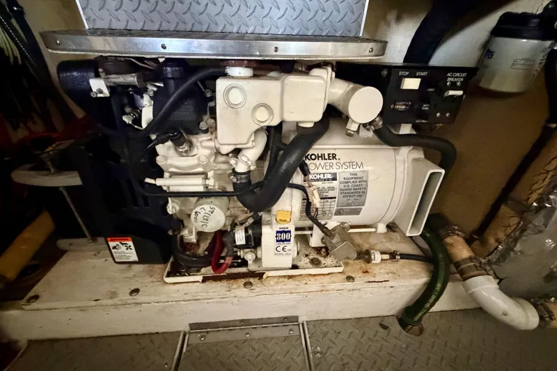 Slide: The Image of Engine compartment of a 2002 Formula 37 Performance Cruiser with Kohler power system. - 23