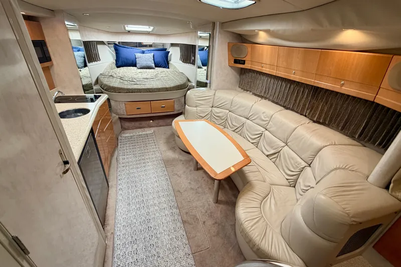 Slide: The Image of 2002 Formula 37 Performance Cruiser interior with cozy seating and modern amenities. - 24
