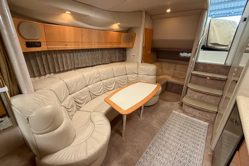 Slide: The Image of Luxurious interior of a 2002 Formula 37 Performance Cruiser with plush seating and elegant design. - 26