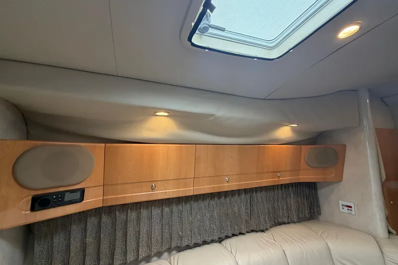 Slide: The Image of Interior of 2002 Formula 37 Performance Cruiser with wood cabinets and ceiling lights. - 29