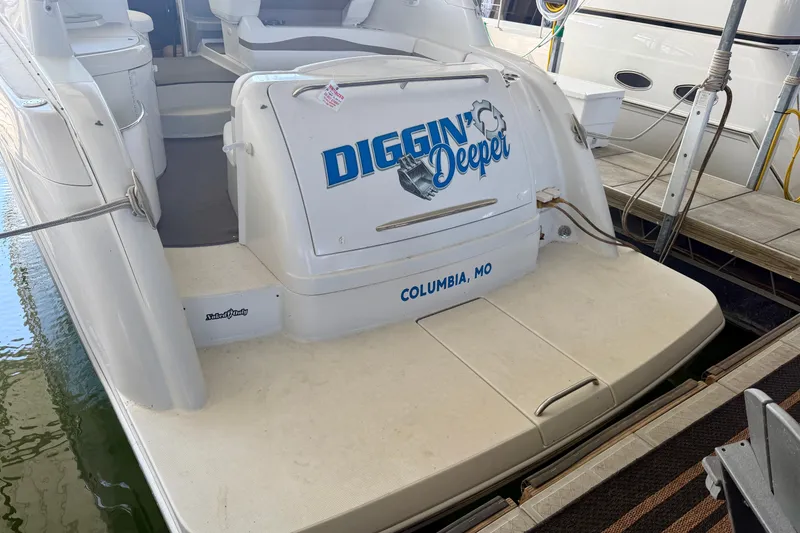 Slide: The Image of 2002 Formula 37 Performance Cruiser docked, featuring "Diggin' Deeper" and Columbia, MO text. - 3