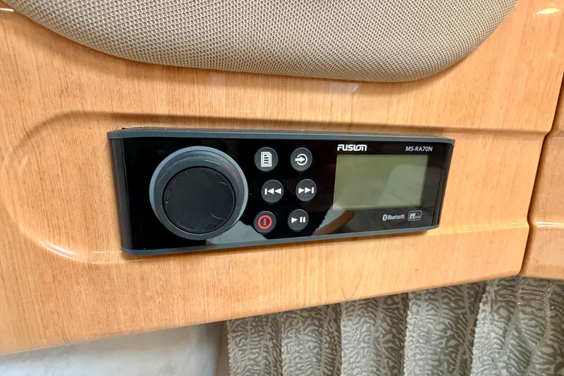 Slide: The Image of Fusion MS-RA70N stereo system in 2002 Formula 37 Performance Cruiser, featuring Bluetooth connectivity. - 30
