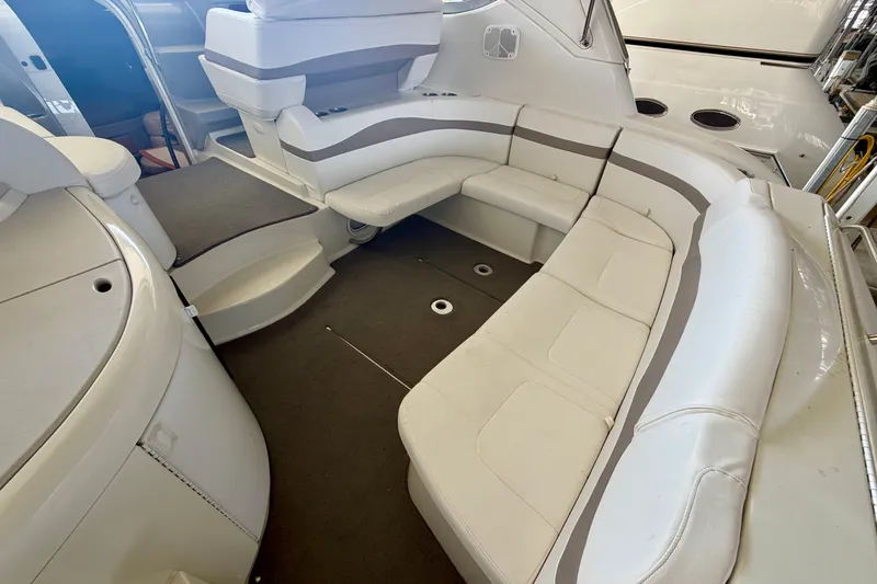 Slide: The Image of 2002 Formula 37 Performance Cruiser interior with white seating and modern design. - 8