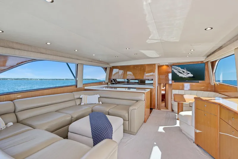 Slide: The Image of Luxurious interior of 2002 Viking 61 Convertible yacht with leather seating and ocean view. - 19