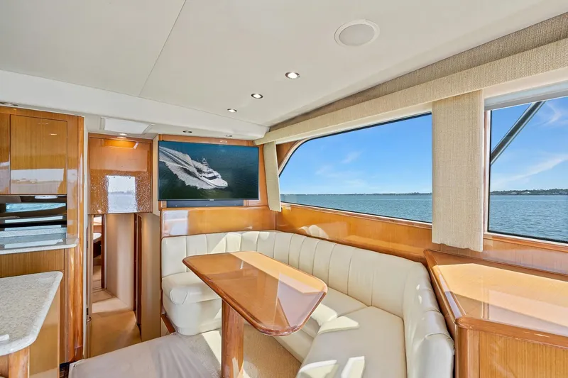 Slide: The Image of Luxurious interior of 2002 Viking 61 Convertible yacht with ocean view. - 30