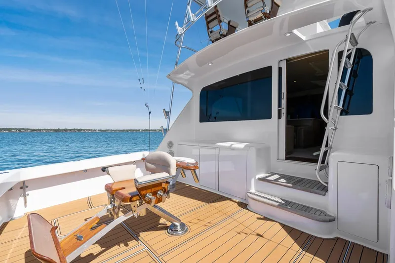 Slide: The Image of 2002 Viking 61 Convertible yacht deck with fishing chair and ocean view. - 34