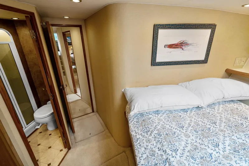 Slide: The Image of Interior of 2002 Viking 61 Convertible yacht with bedroom and bathroom. - 55
