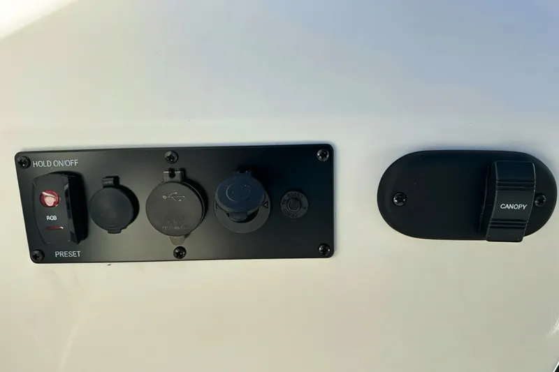 Slide: The Image of Control panel of 2026 Sweetwater 2286 QS boat with RGB and canopy switches. - 17