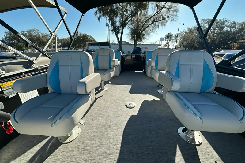 Slide: The Image of Interior of 2026 Sweetwater 2286 QS boat with modern seating and canopy. - 28