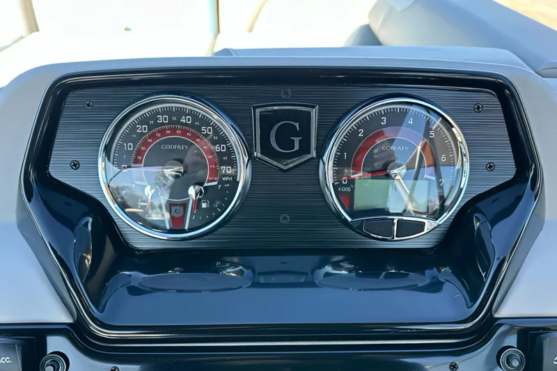Slide: The Image of Dashboard of 2026 Sweetwater 2286 QS boat with speedometer and tachometer. - 9