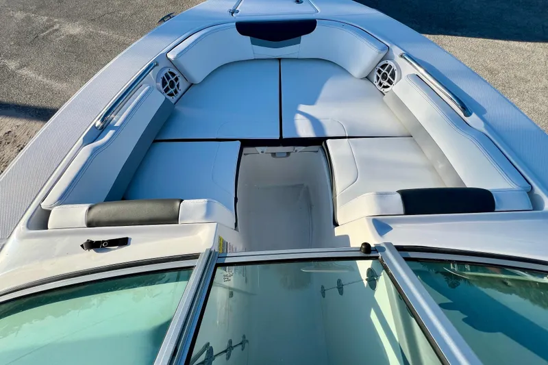 Slide: The Image of 2024 Robalo R207 Dual Console boat with spacious seating and modern design. - 15