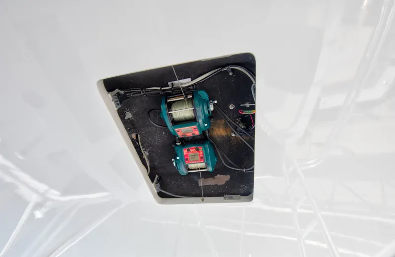 Slide: The Image of Electrical components inside a 2001 Viking 55 Convertible yacht. - 11