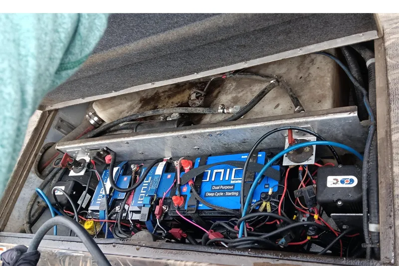 Slide: The Image of Battery compartment of a 2018 G3 Sportsman 17 Camo boat. - 13