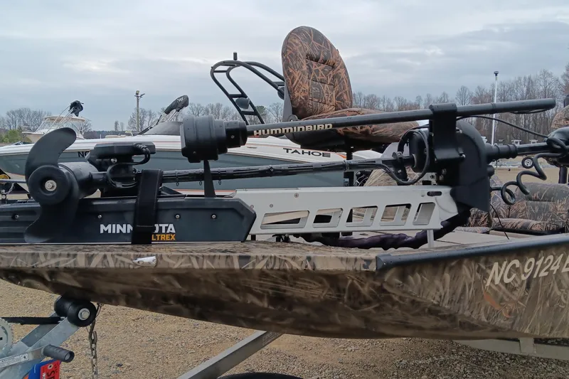 Slide: The Image of 2018 G3 Sportsman 17 Camo boat with Minn Kota Ultrex motor, camo seating, and Humminbird equipment. - 8