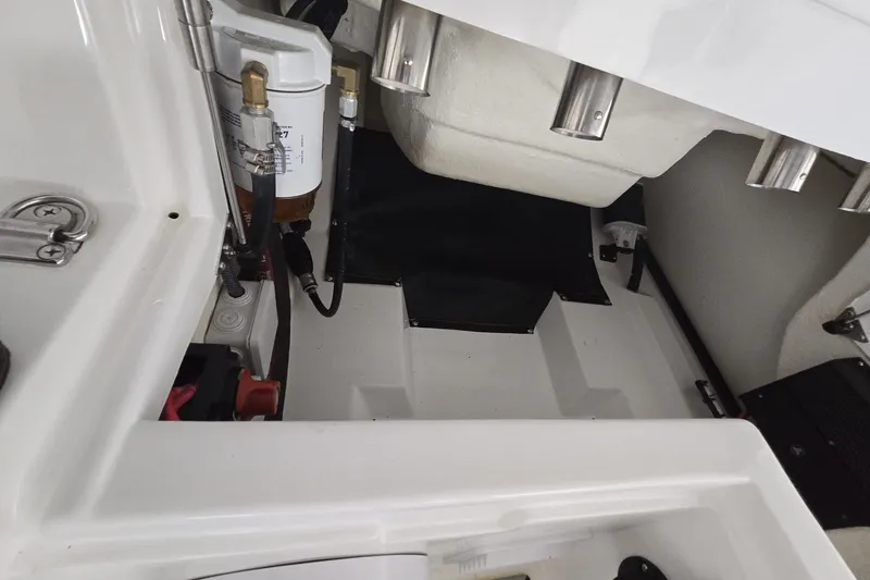 Slide: The Image of Interior view of 2025 Walker Bay Venture 13 boat, showcasing engine compartment details. - 3