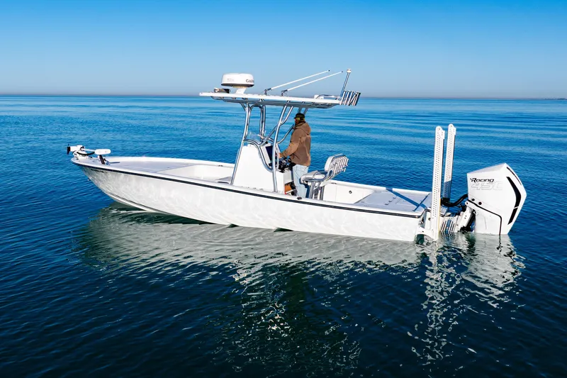The Image of 2016 Barker Boatworks 26 Calibogue Bay on calm blue water, side view. - 0