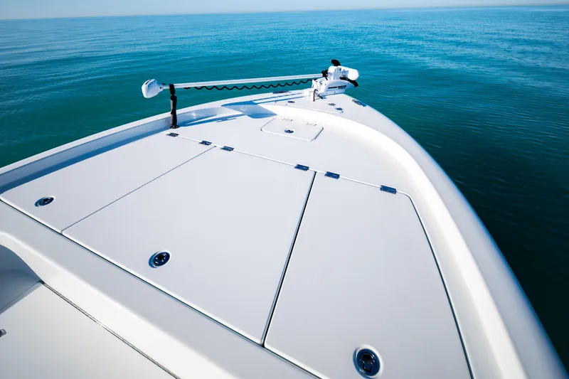 Slide: The Image of 2016 Barker Boatworks 26 Calibogue Bay on calm ocean waters. - 8