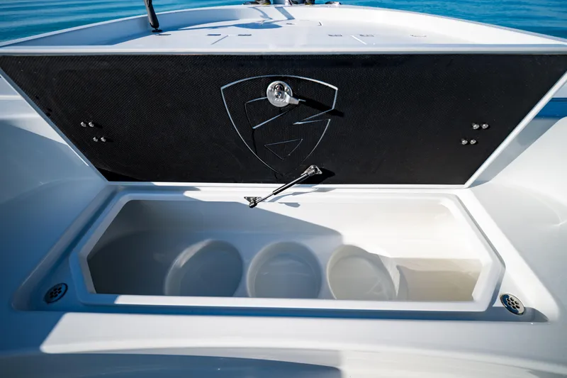 Slide: The Image of 2016 Barker Boatworks 26 Calibogue Bay storage compartment open on deck. - 12