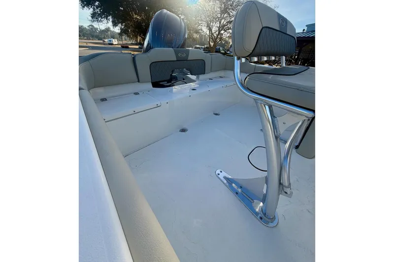 Slide: The Image of 2026 Key West 203 FS boat interior with seating and console, showcasing modern design. - 12