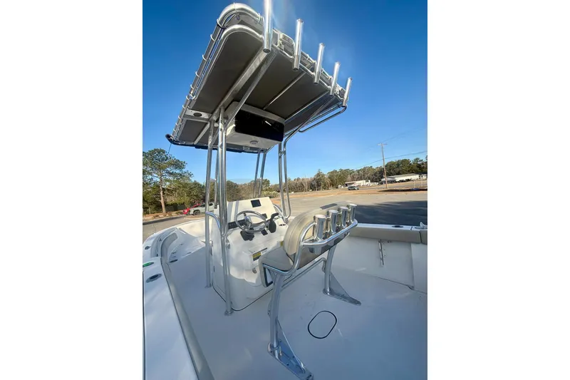 Slide: The Image of 2026 Key West 203 FS boat interior with T-top and helm station. - 13