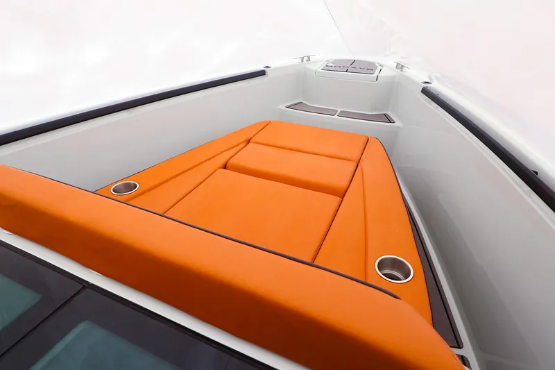 Slide: The Image of 2023 Saxdor 320 GTO boat with orange seating and sleek design. - 15