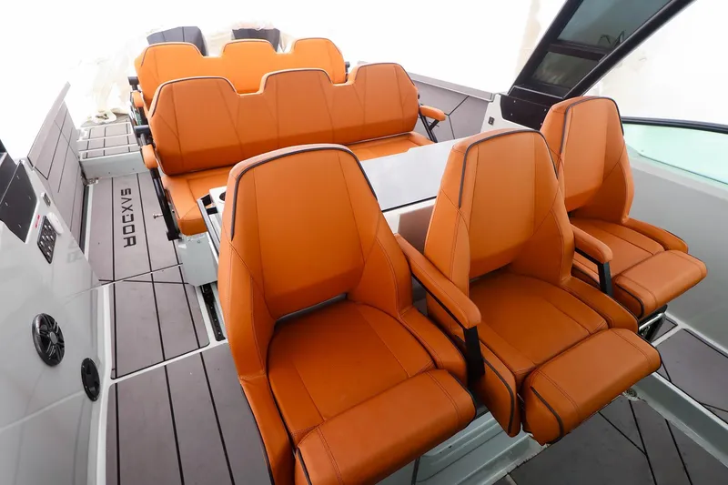 Slide: The Image of 2023 Saxdor 320 GTO interior with orange seating and modern design. - 17
